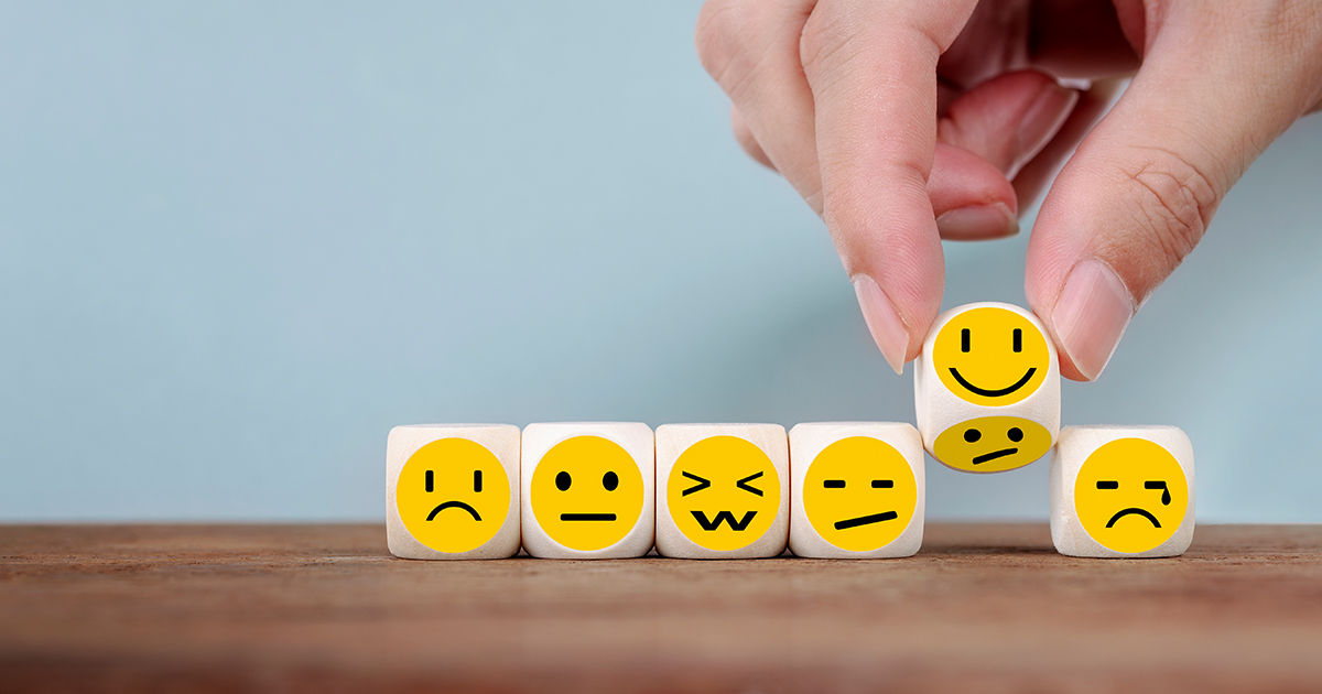 wood blocks with various emotions illustrated on them