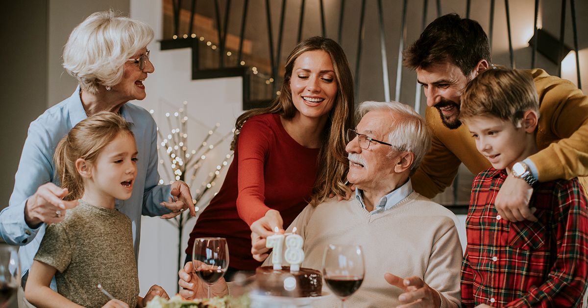 purpose and social connectivity header a family gathers for an elder family member's birthday